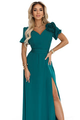 653-1 Elegant long dress with a rose, belt and high slit - bottle green